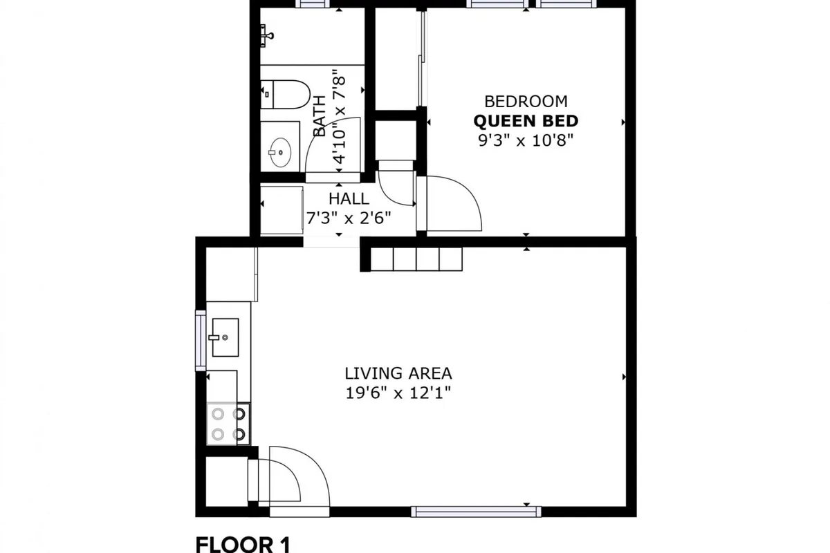 A cozy, thoughtfully arranged living area leading to a visible bedroom and hallway. The space is inviting, with comfortable furnishings ideal for unwinding after a busy day, and an open layout that connects relaxation, work, and rest zones.